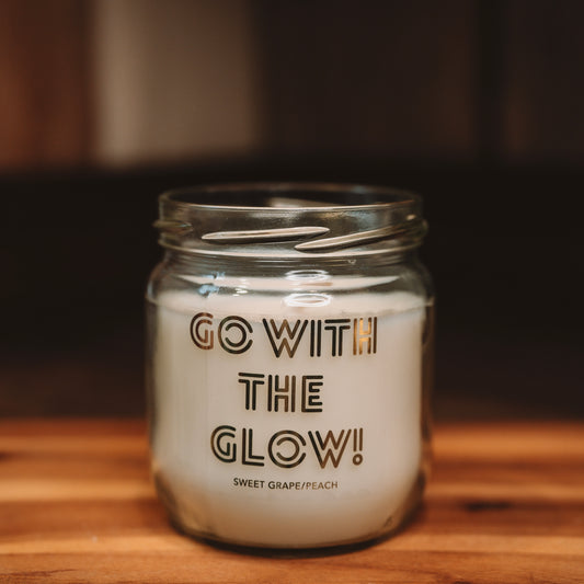 Aromatic candle with "grape, peach aroma"